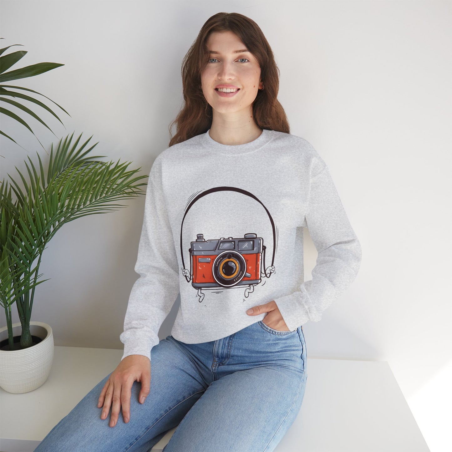 The Camera Unisex Heavy Blend™ Crewneck Sweatshirt | Stylish Graphic Sweatshirt for Photography Lovers - ArtShirt Couture