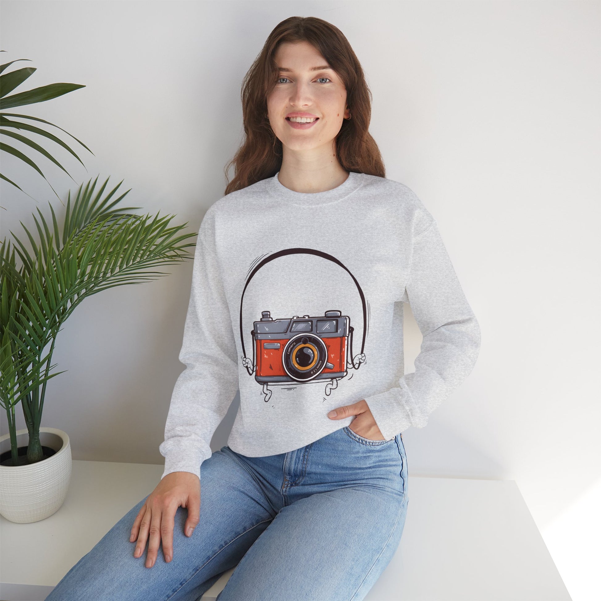The Camera Unisex Heavy Blend™ Crewneck Sweatshirt | Stylish Graphic Sweatshirt for Photography Lovers - ArtShirt Couture
