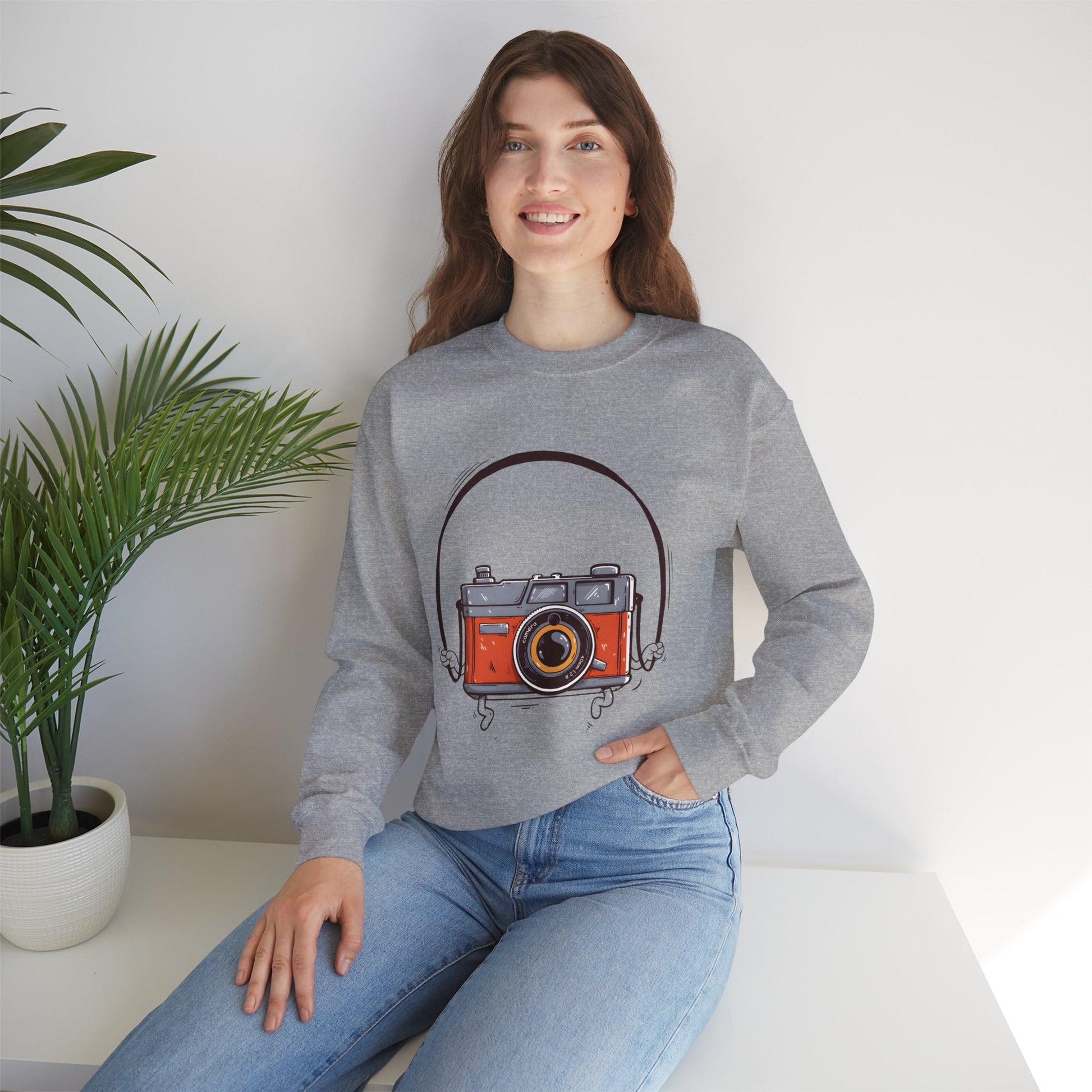 The Camera Unisex Heavy Blend™ Crewneck Sweatshirt | Stylish Graphic Sweatshirt for Photography Lovers - ArtShirt Couture