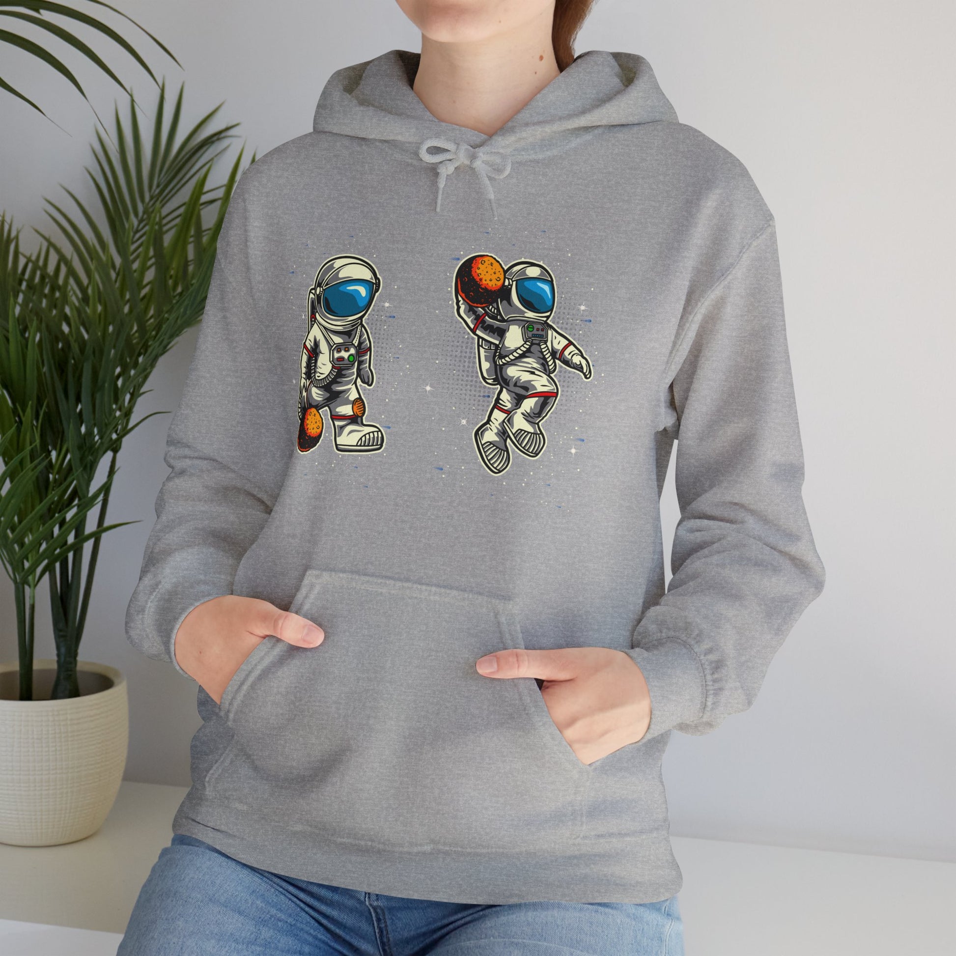 The Astronaut Unisex Heavy Blend™ Hoodie | Space-Themed Hoodie with Cool Cosmic Design - ArtShirt Couture